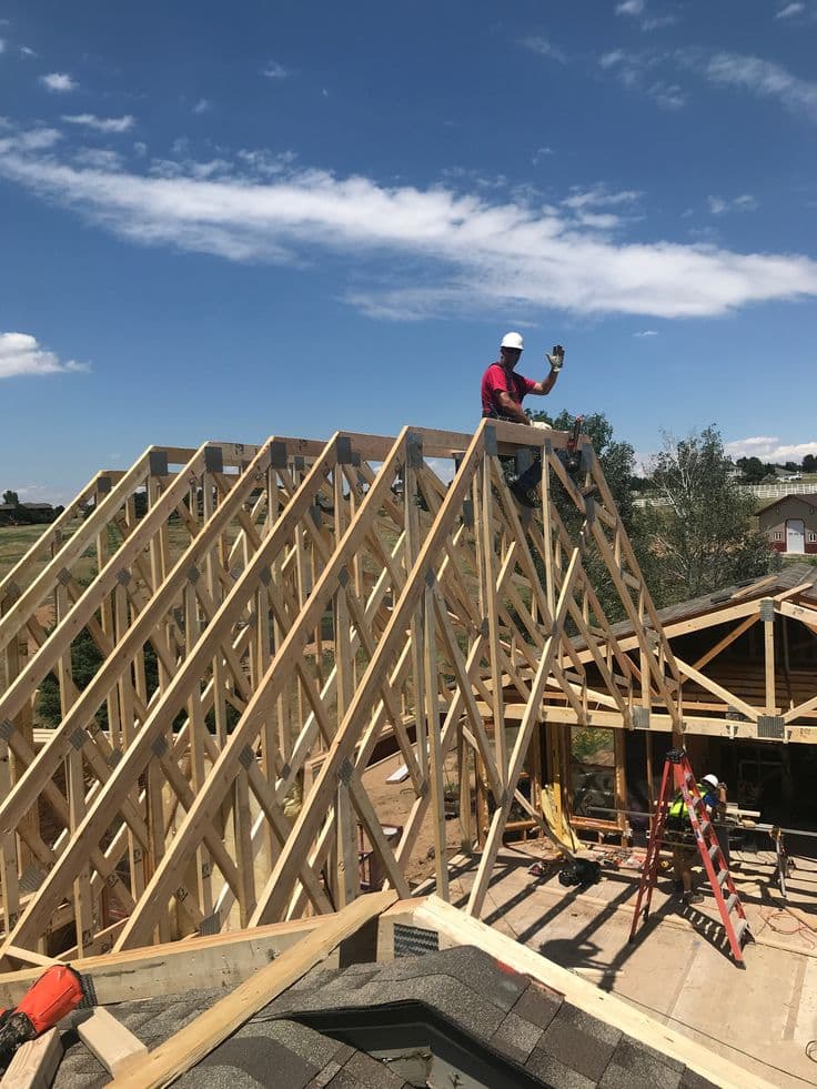 Roof trusses set and braced on a house under construction in Abington
